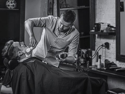 Barber cuts beard